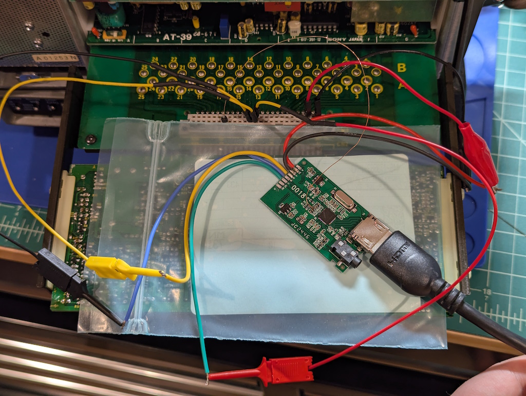 The Wii2HDMI module connected inline alongside the EN-39